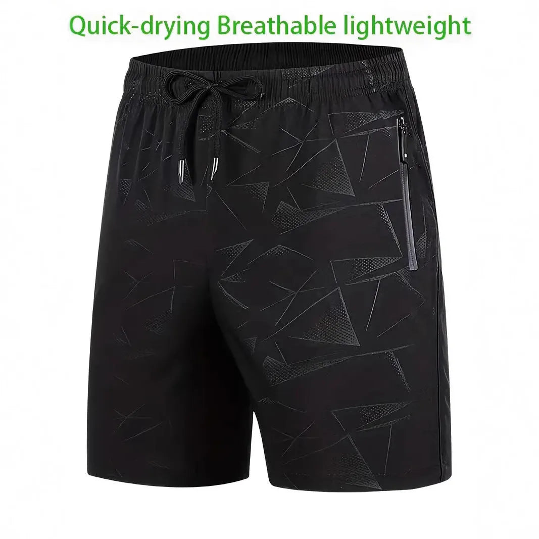 Men's loose-fit black polyester sports shorts with elastic waistband laid flat.