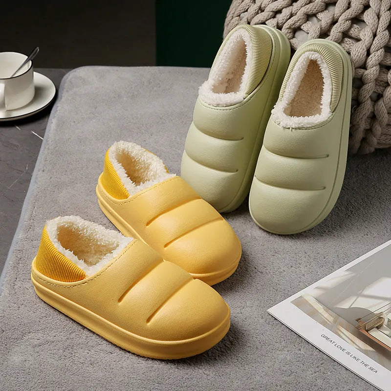 Women's winter slippers in green with plush lining and textured EVA sole, shown as sleeve-style overshoes.