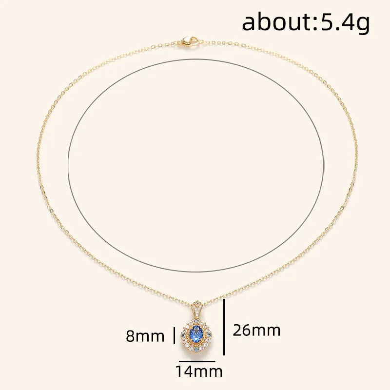 Huitan yellow gold necklace with adjustable chain and sparkling inlaid zircon gem pendant on a model.