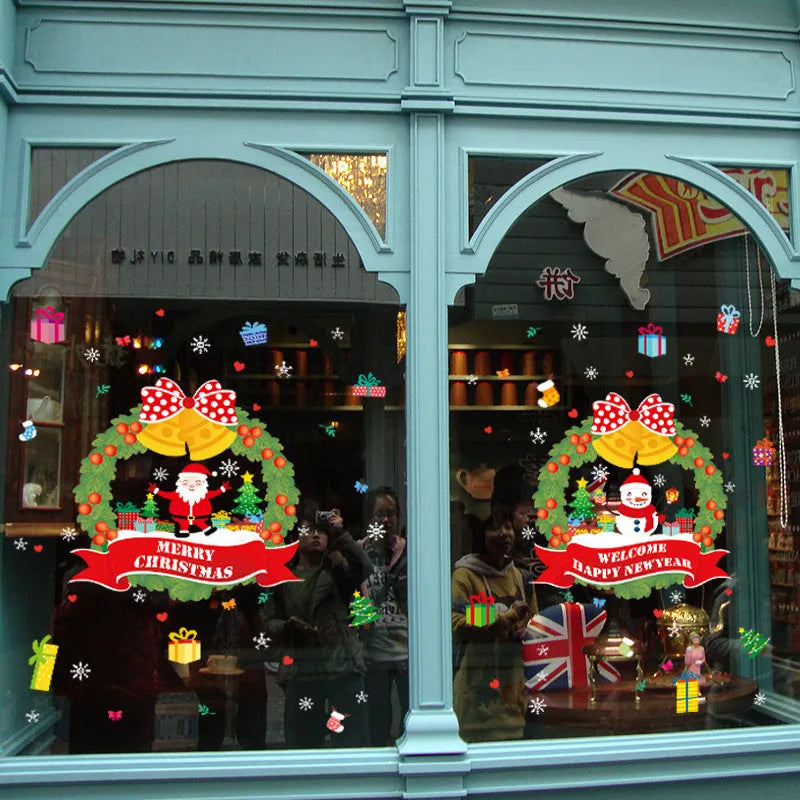 Two large colourful Christmas wall stickers with cartoon designs measuring 60cm by 45cm each for window decoration