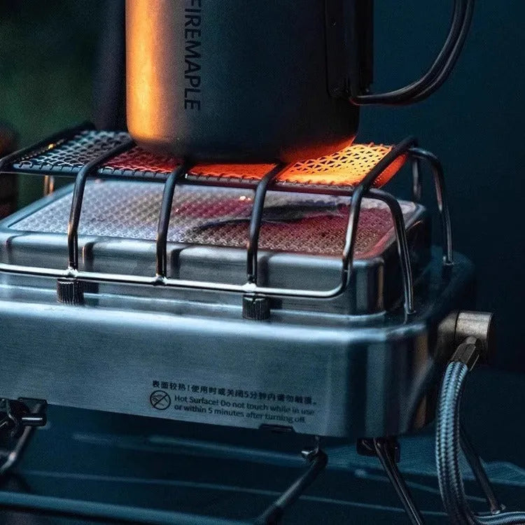 Portable stainless steel electric heating stove with ceramic elements, shown with dimensions.