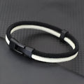 Handmade woven mobile phone hand strap in black and white with Milan rope alloy construction